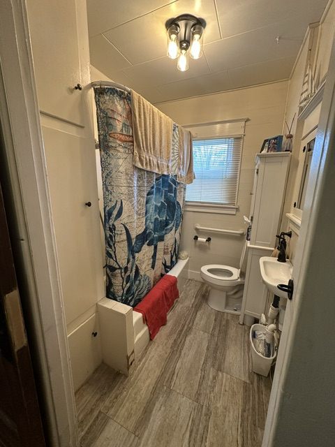 A dated rental bathroom before its renovation
